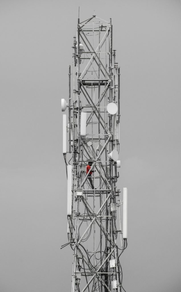 a-tall-tower-with-many-antennas-on-top-of-it-rm0jorrtp0m